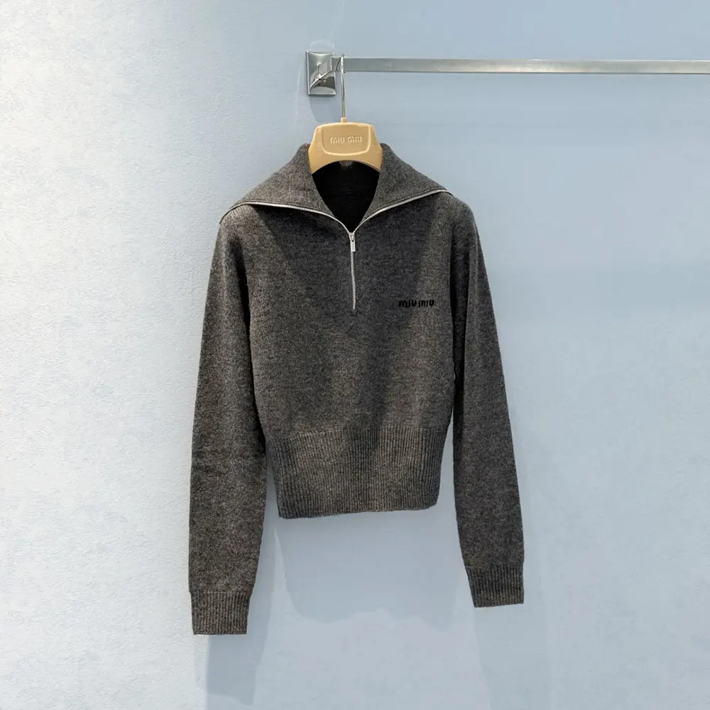 Side profile showing silhouette of Miu Miu Women Cashmere Half-Zipper Sweater