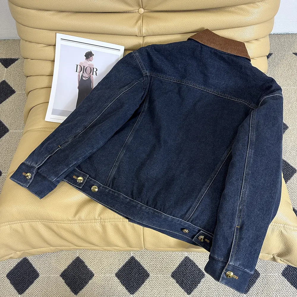 Side angle showing silhouette and elastic cuff on Miu Miu blouson jacket