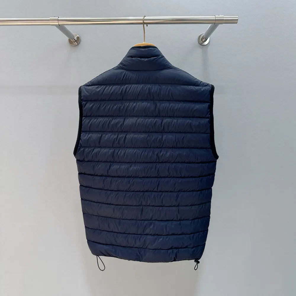 Side angle showing slim silhouette of Miu Miu Women Light Pongé Down Vest navy