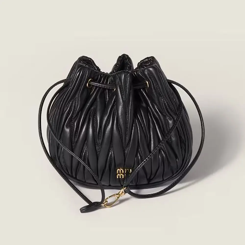 Front view of Miu Miu Women Matelassé Nappa Leather Pouch-Black showing quilted texture