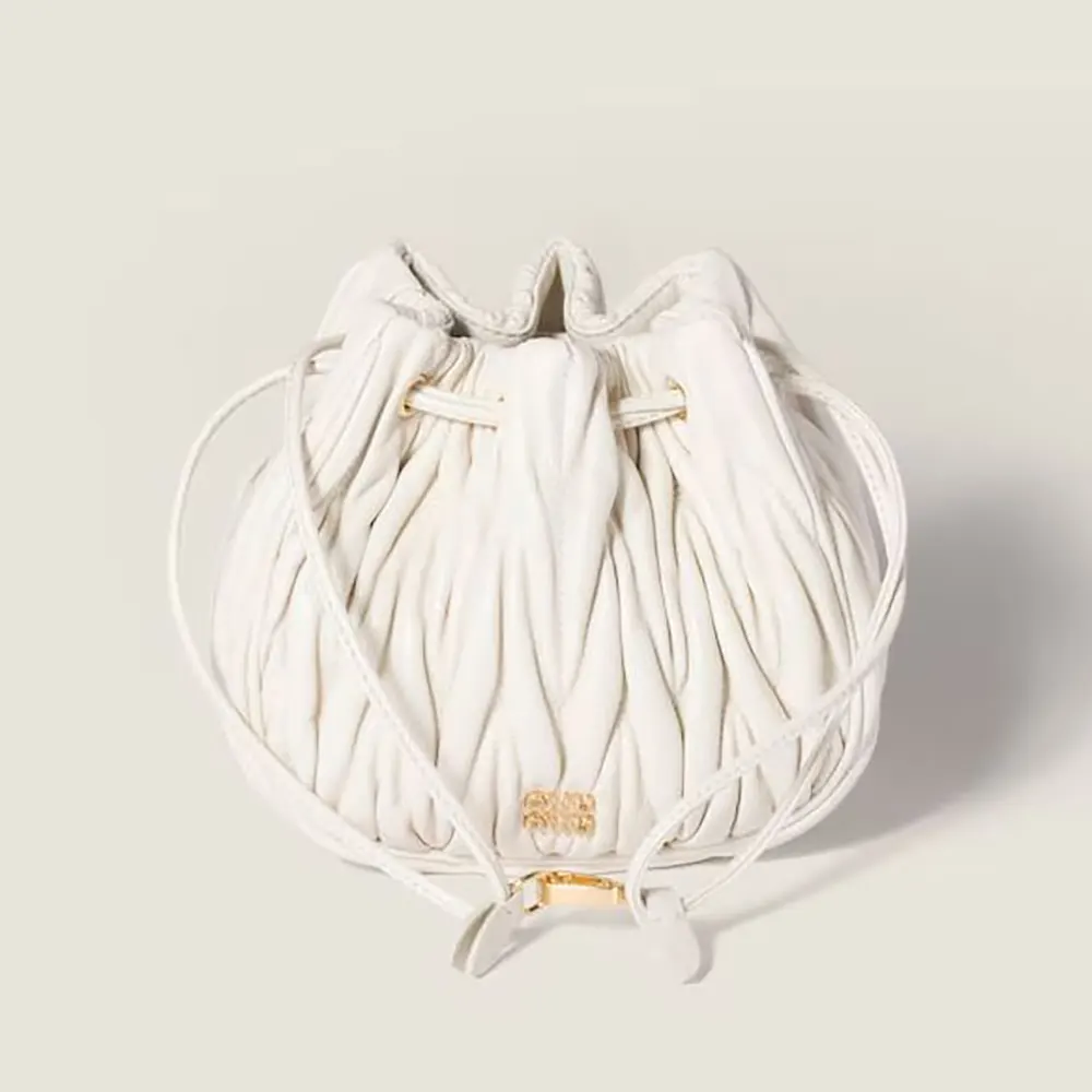 Front view of Miu Miu Women Matelassé Nappa Leather Pouch-White showing quilted texture
