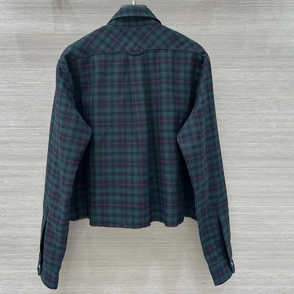 Side angle showing relaxed fit of Miu Miu Women Plaid Shirt with Lettering Logo