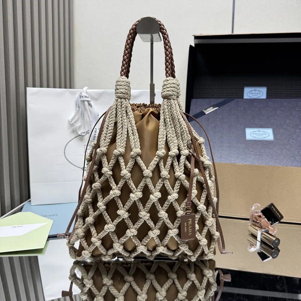 Detail of branded leather trim on Prada Unisex Macramé Tote