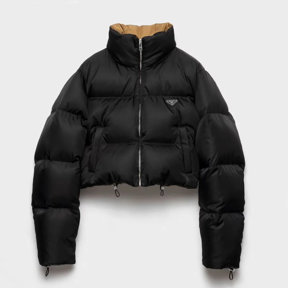 Front view of Prada Women Cropped Re-Nylon Down Jacket-Black showcasing zip closure