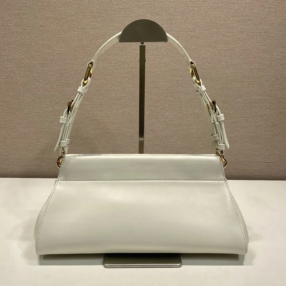 Side profile of Prada Women Enchaîné Medium Leather Bag-White showing silhouette