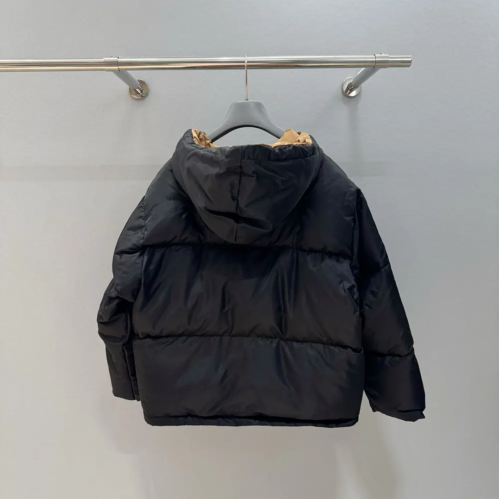 Side angle highlighting silhouette of Prada Women Re-Nylon Down Jacket-Black