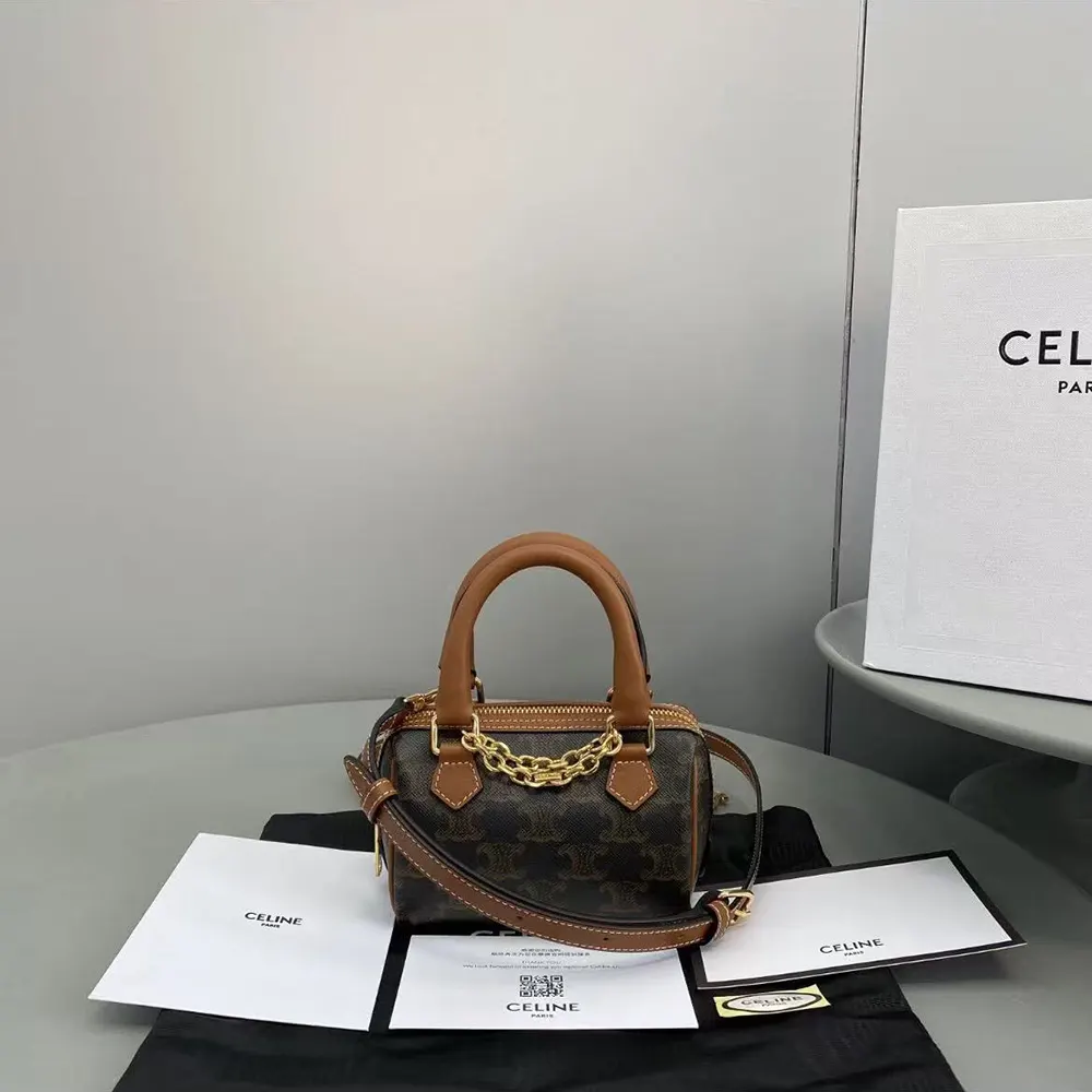 Close-up of gold-tone Triomphe hardware on the Celine Women Mini Boston