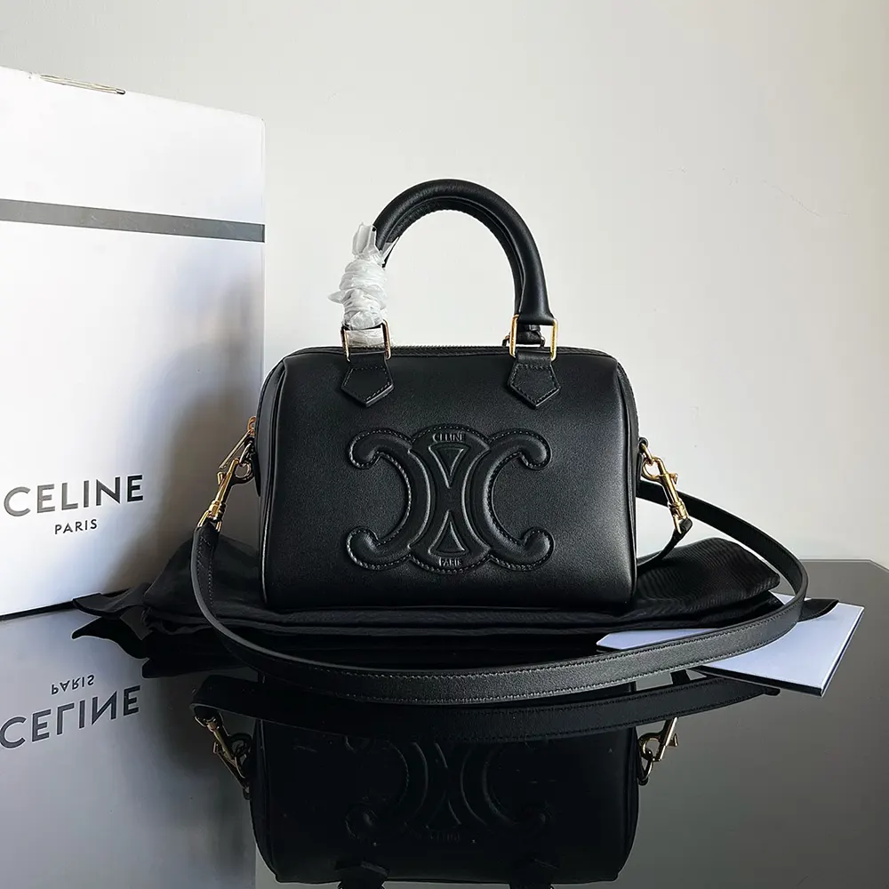 Close-up of gold-tone hardware on Celine Women Small Boston bag
