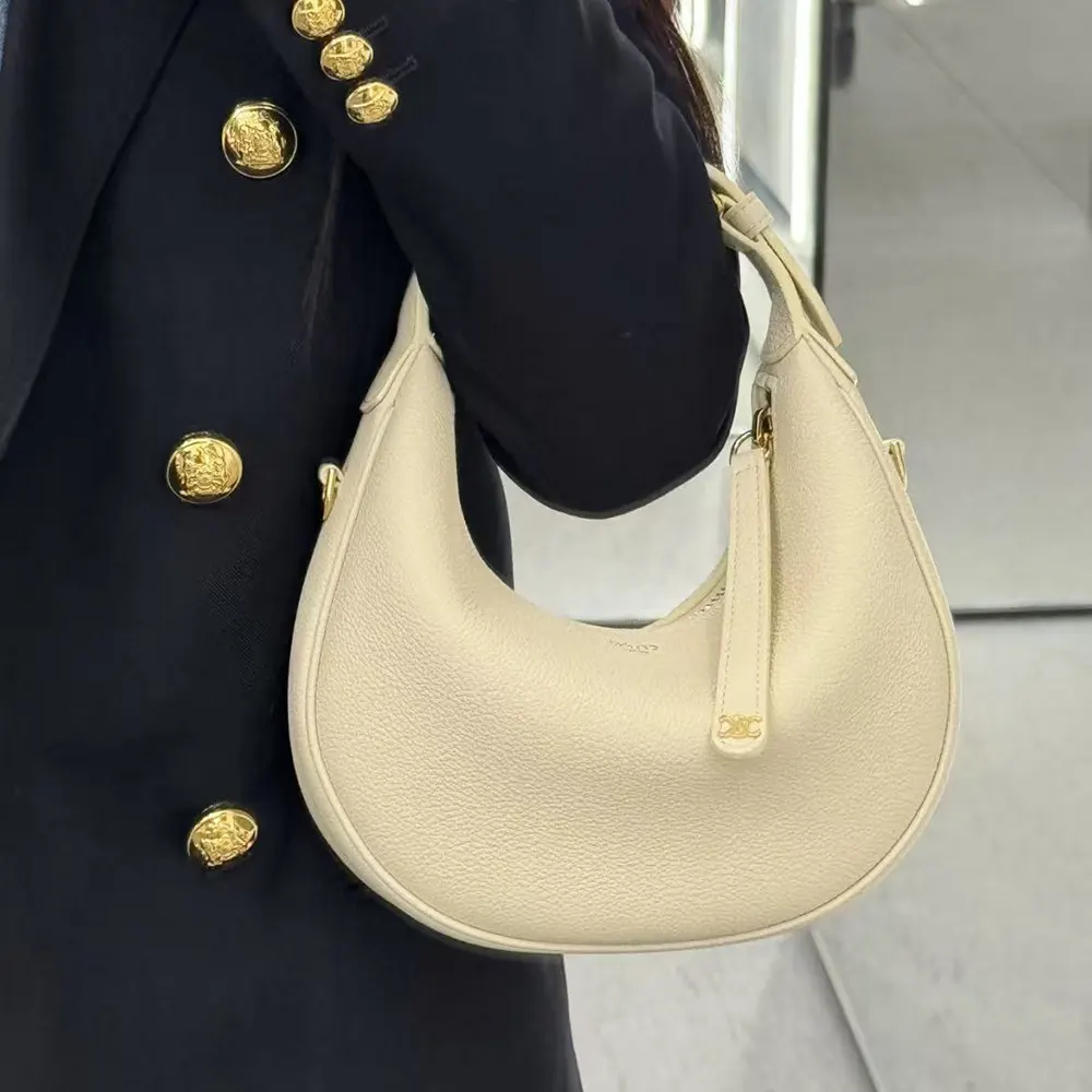 Side profile showing compact silhouette of Celine Women Teen Celine Llulu