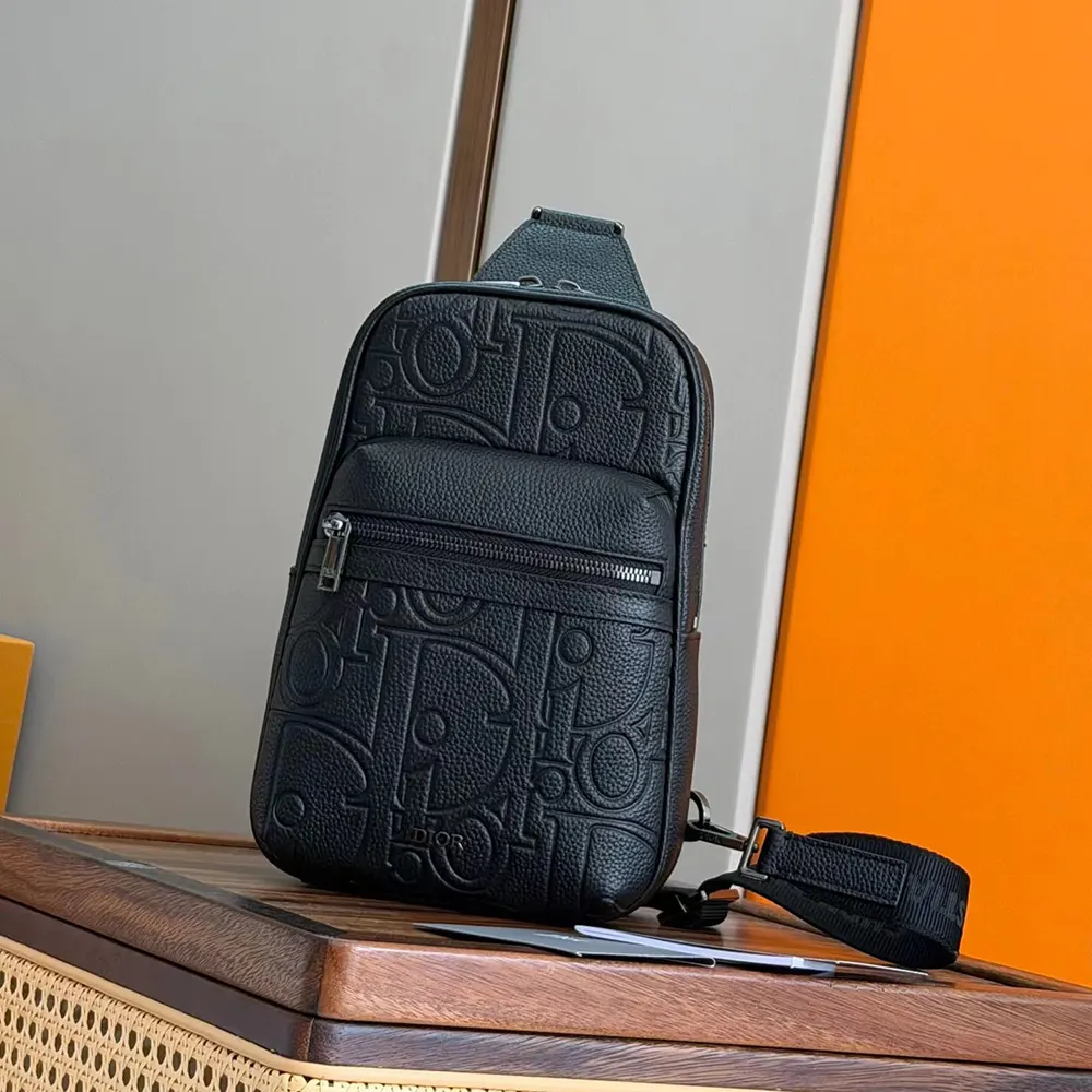 Close-up on black grained calfskin and Dior hardware detail