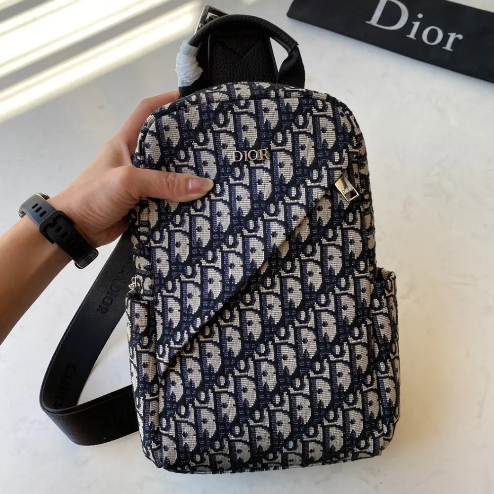 Close-up detail of silver hardware on Dior Men Sling Bag Black and Beige Dior Oblique Jacquard