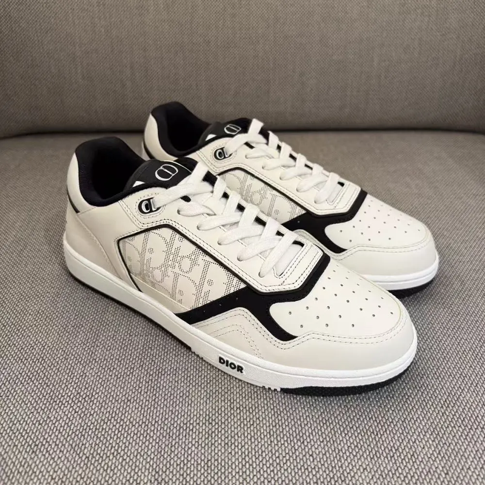 Overhead view showing laces and contrasting black accents on Dior sneaker