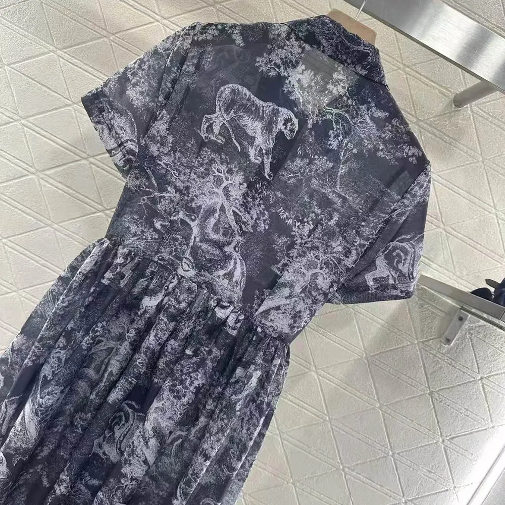 Side profile highlighting mid-length silhouette of Dior Women Dioriviera Dress