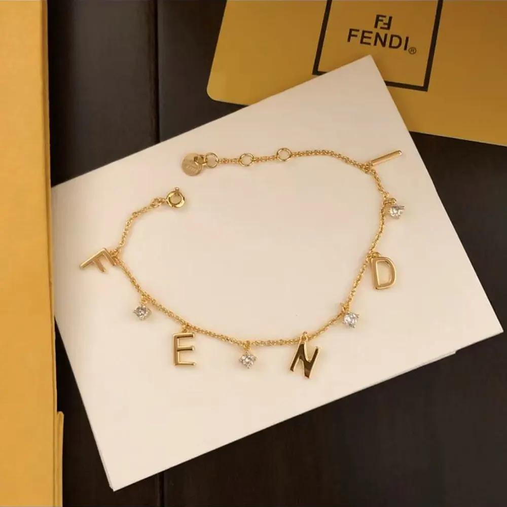 Side view of Fendi Women Forever Fendi Gold-colored Bracelet on wrist