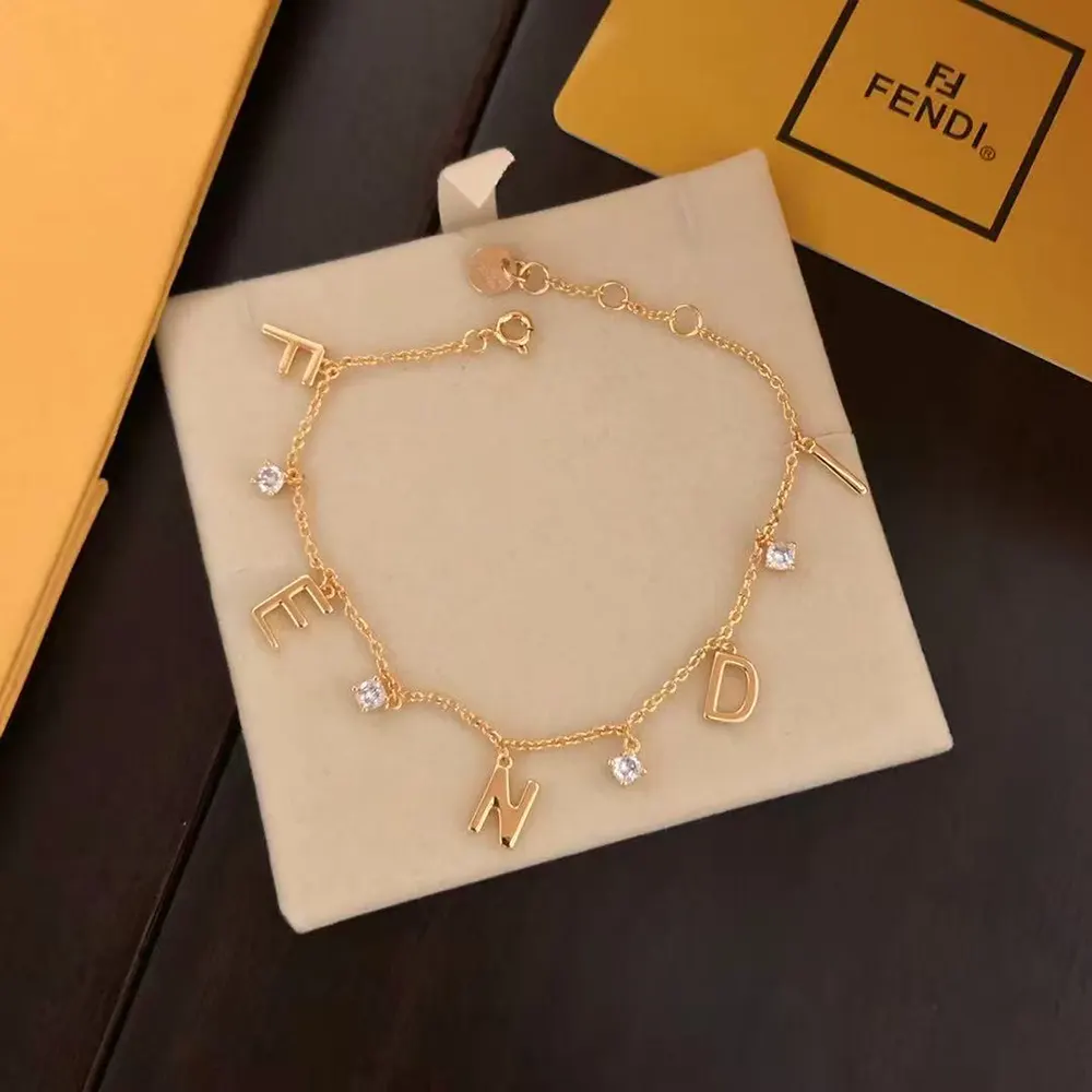 Close-up of Fendi Women Forever Fendi Gold-colored Bracelet clasp detail