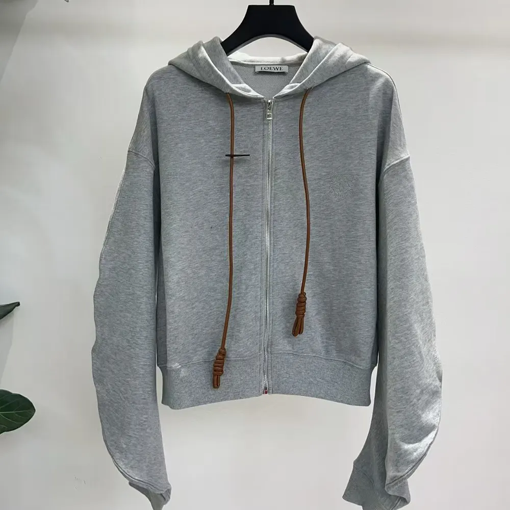 Close-up of zip and embossed hardware on Loewe Women Flamenco Hoodie