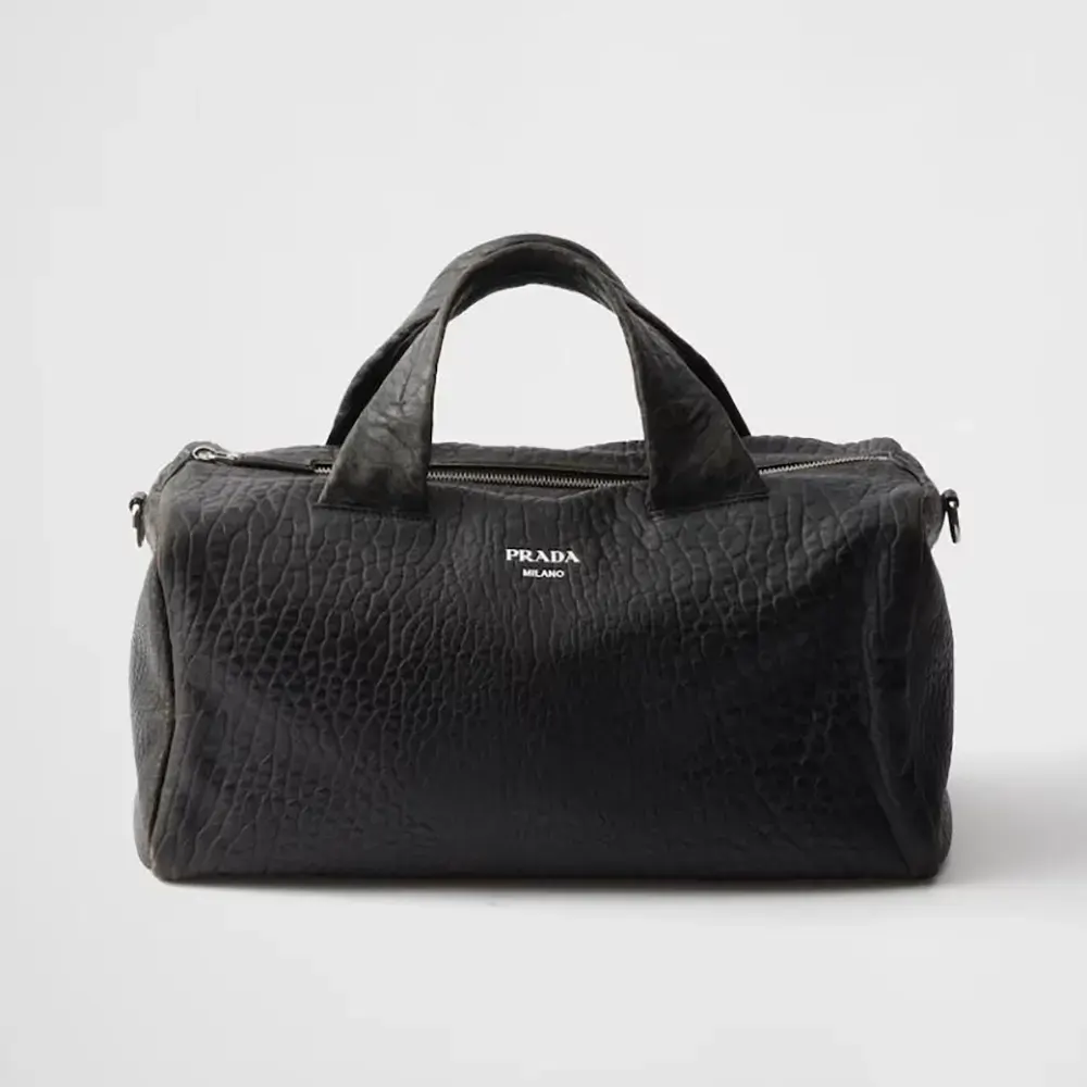 Front view of Prada Unisex Nappa Leather Duffle Bag-Black showing zip closure
