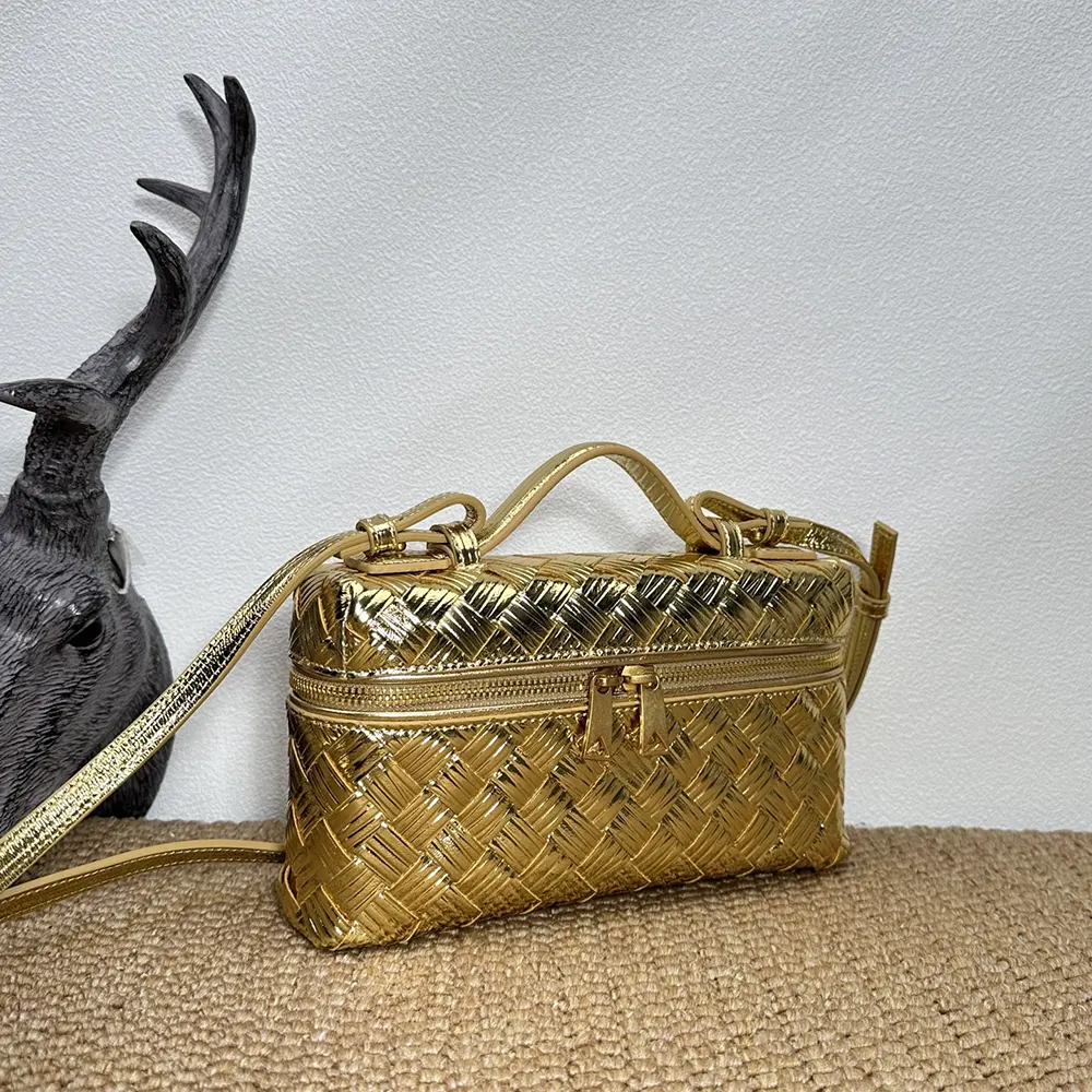 Side profile showing magnetic closure on Bottega Veneta Women Bang Bang-Gold