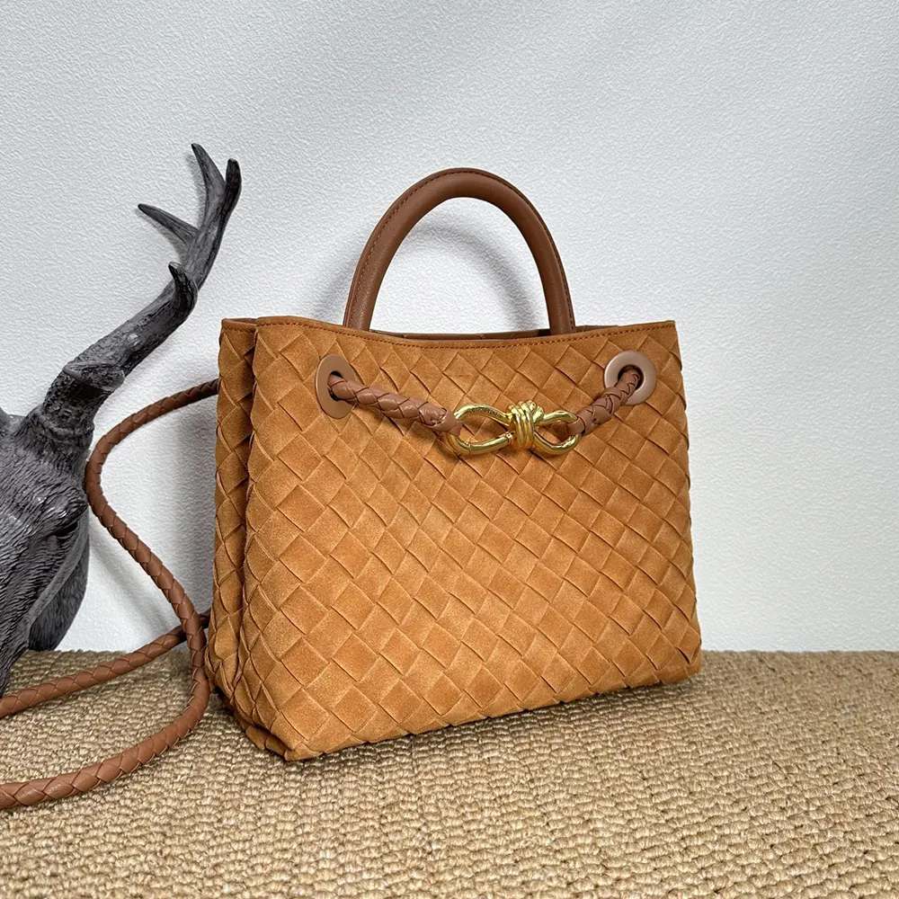 Side angle showing gold hardware on Bottega Veneta Women Small Andiamo-Brown