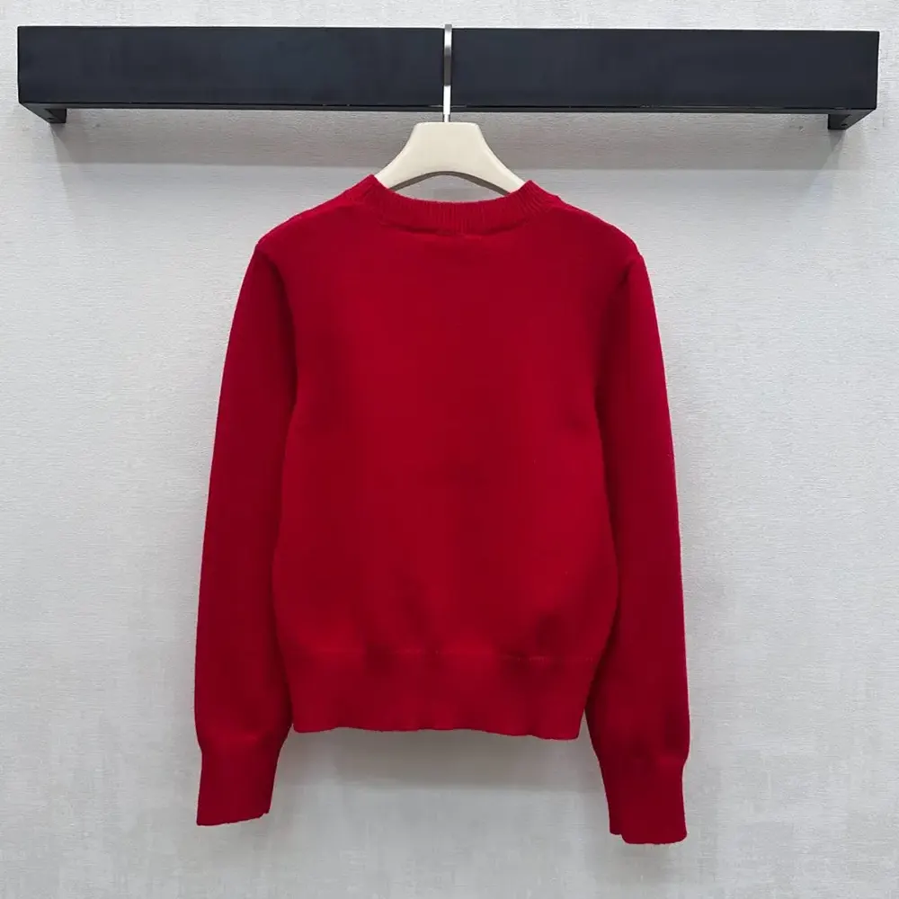 Side profile showing button closure of Burberry Men Cross Stitch EKD Wool Cashmere Sweater-Red
