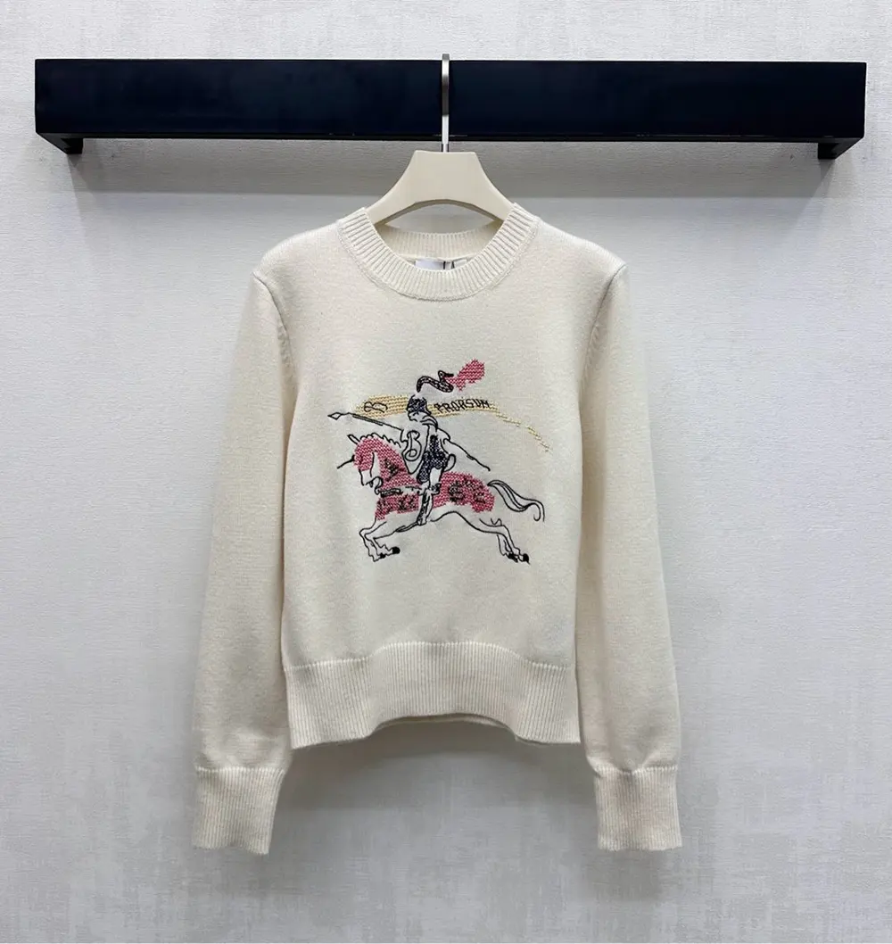 Close-up detail of cross stitch on Burberry Men Cross Stitch EKD Wool Cashmere Sweater-White