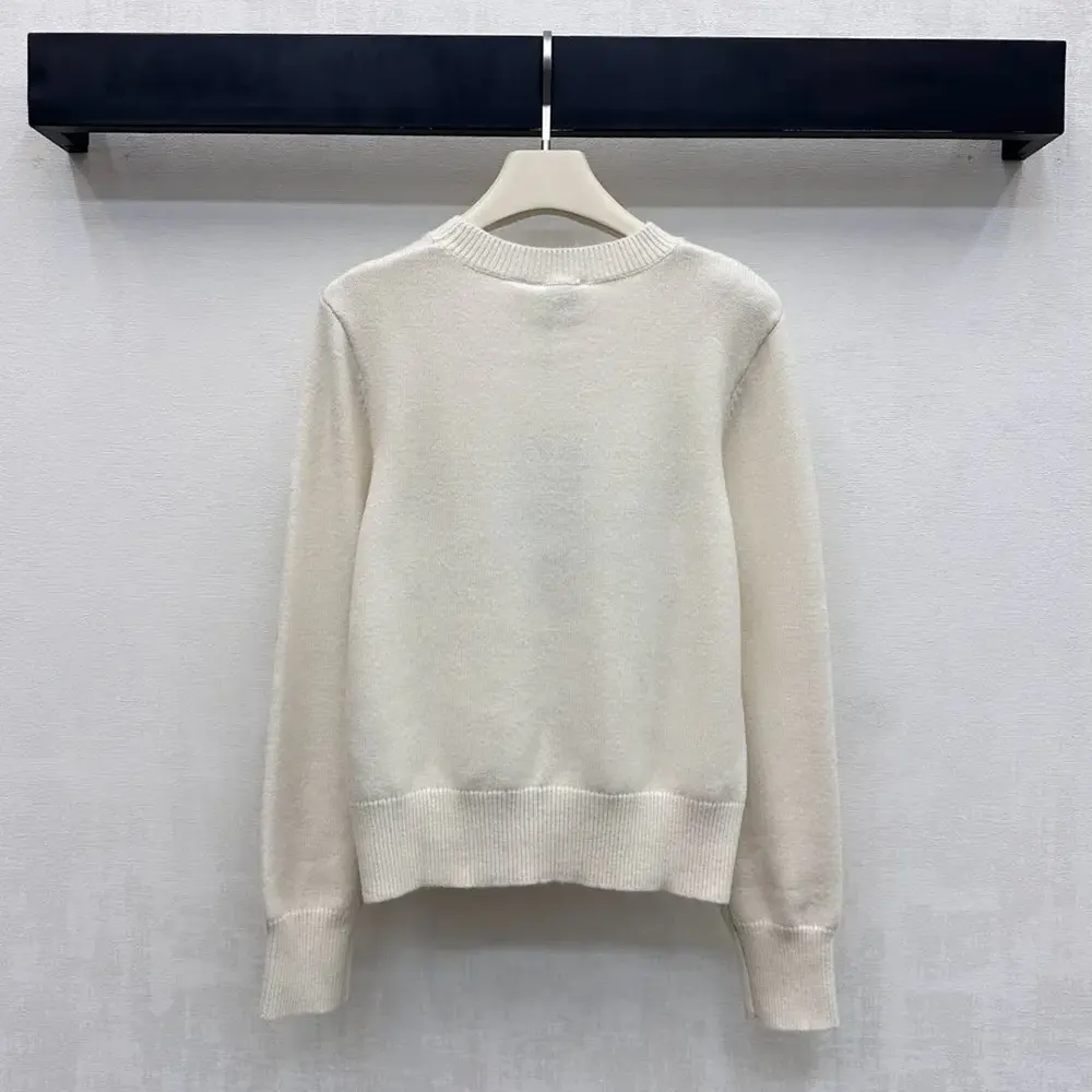 Side angle showing fit of Burberry Men Cross Stitch EKD Wool Cashmere Sweater-White