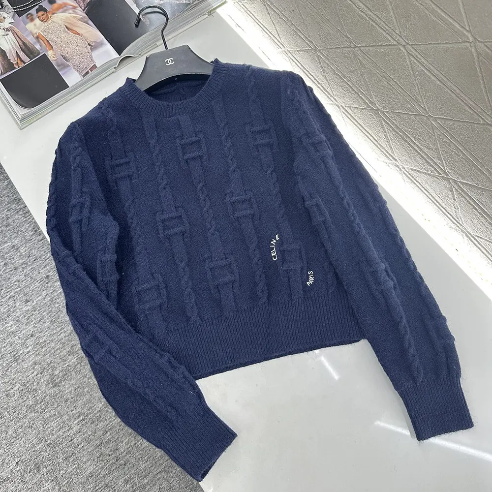 Close-up of signature chain detail on Celine Men Crewneck Sweater