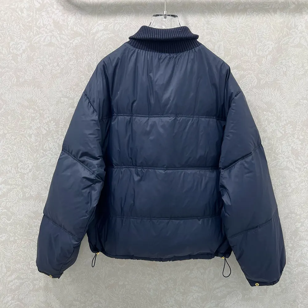 Side angle showing relaxed fit of Celine Women Puffer Jacket