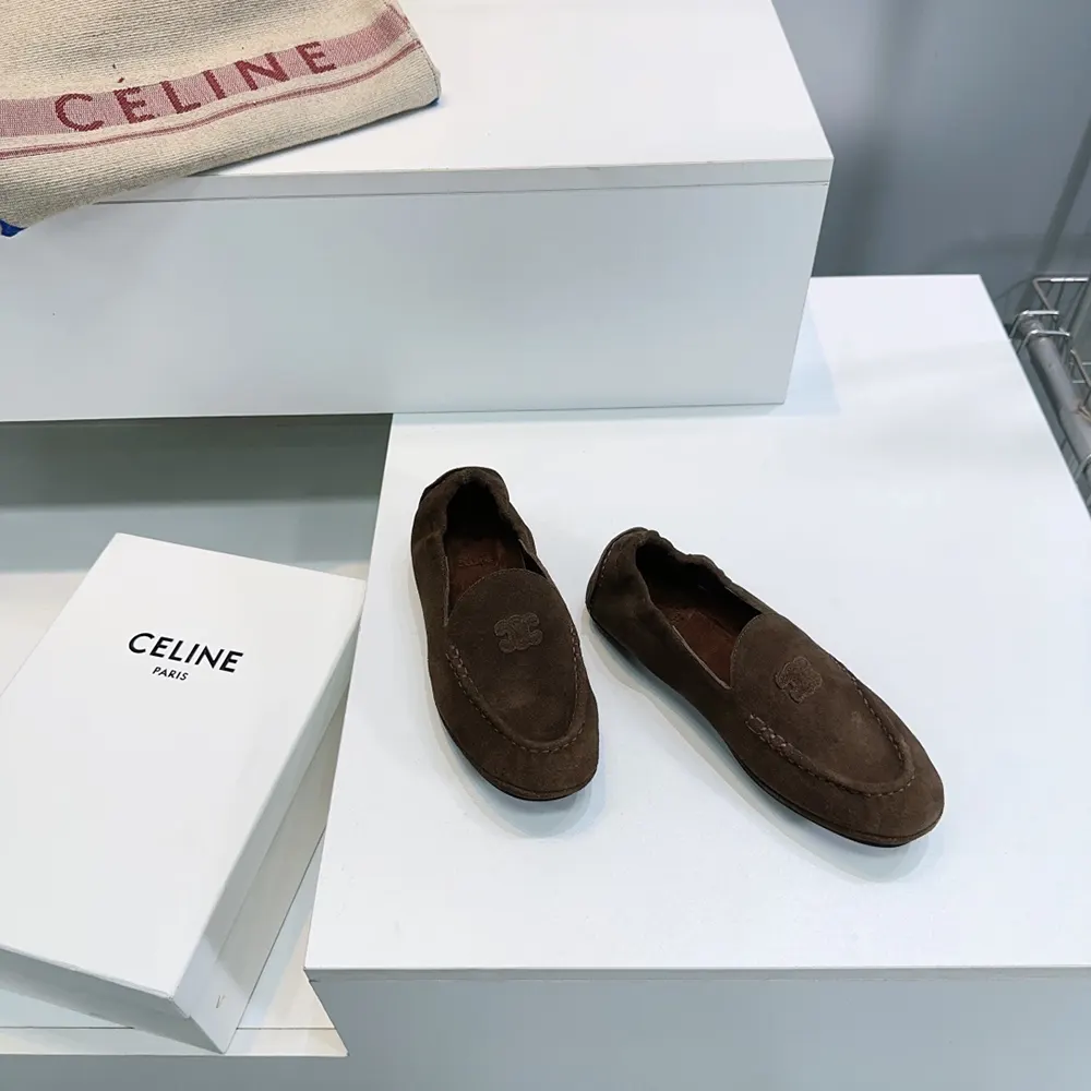 Top view showing embossed Celine logo on Adam Loafer in chocolate