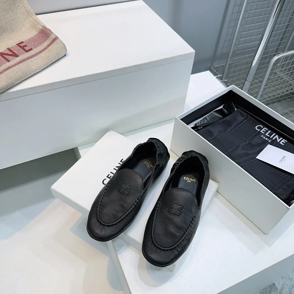 Close-up of black goatskin texture on Celine Adam-Slip-On Loafer