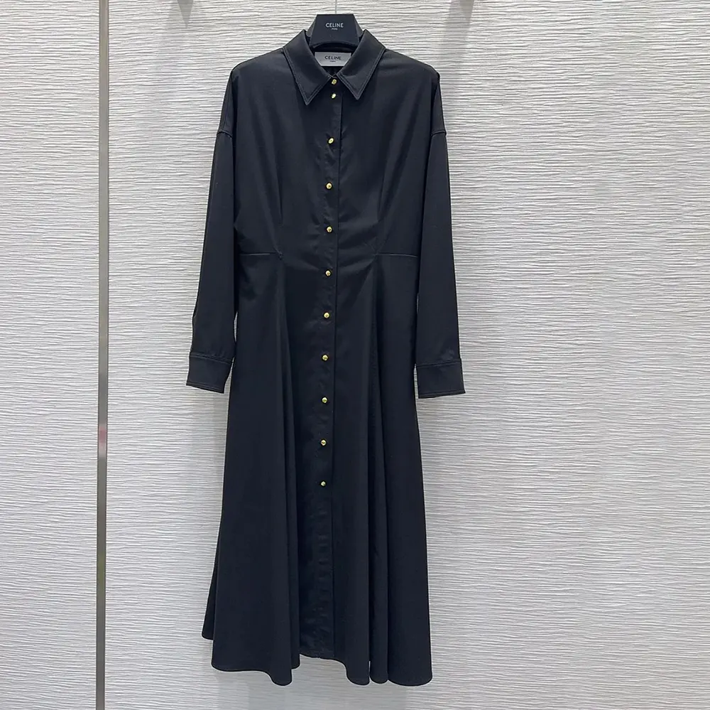 Side angle of Celine Women Dress in Wool-Black highlighting fabric texture