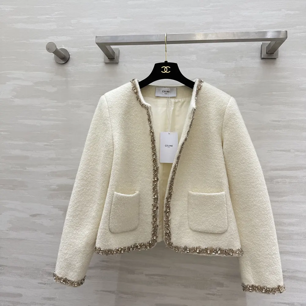 Close-up of embroidery detail on Celine Women Embroidered Chelsea Jacket sleeve