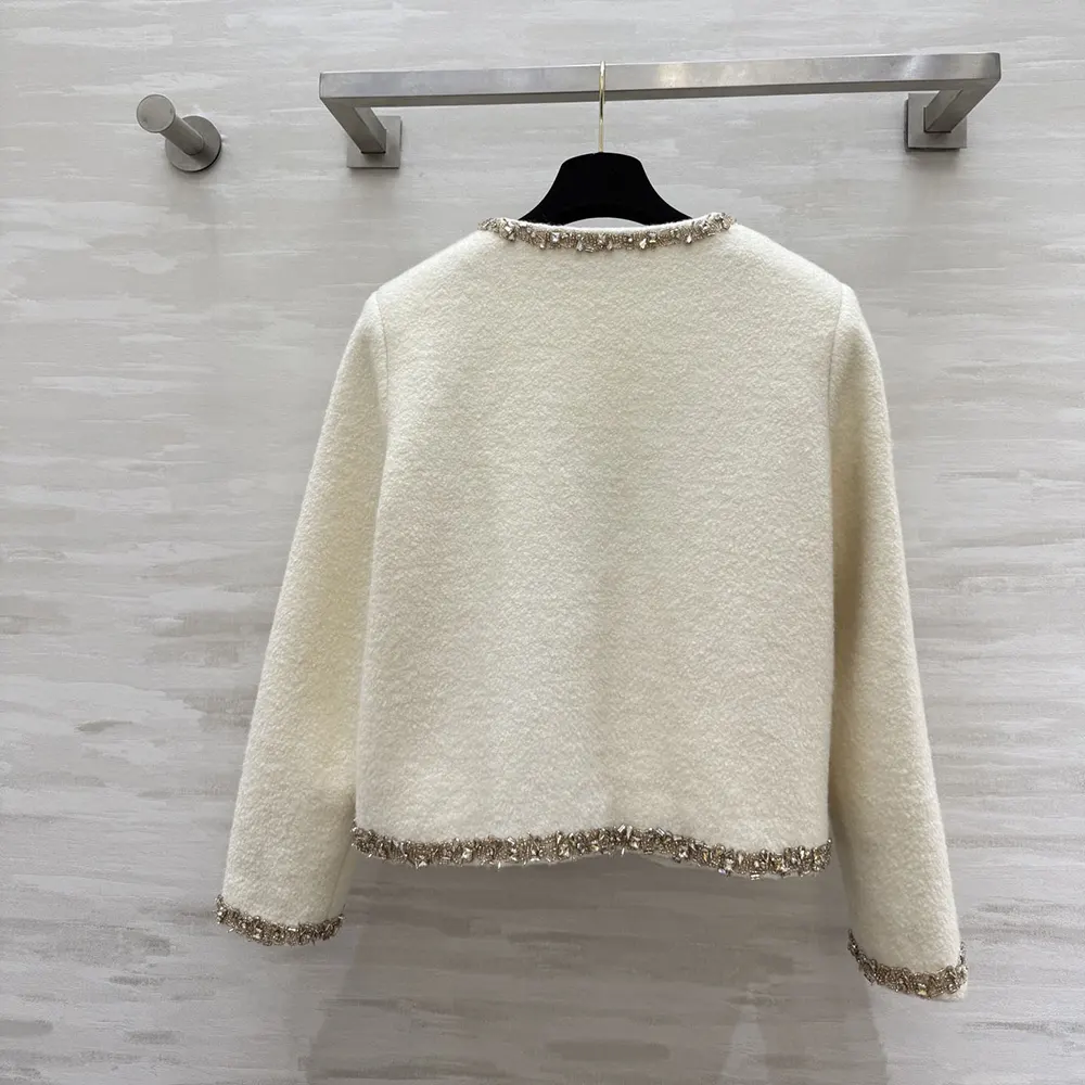 Side profile showing tailored silhouette of Celine Women Embroidered Chelsea Jacket