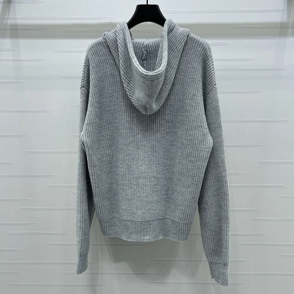 Side angle showing hood and relaxed fit of Celine Women Hooded Cardigan In Ribbed Wool-Grey