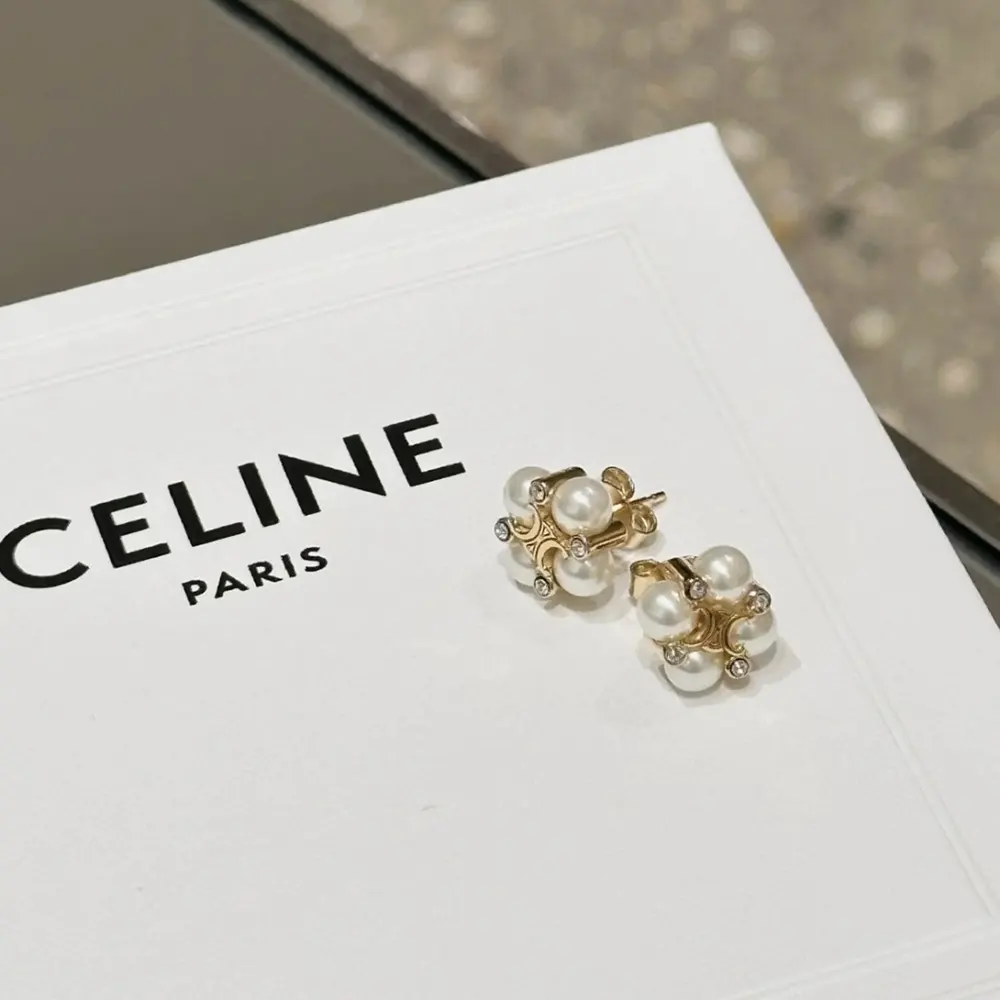 Close-up detail on strass resin pearls of Celine Les Perles studs