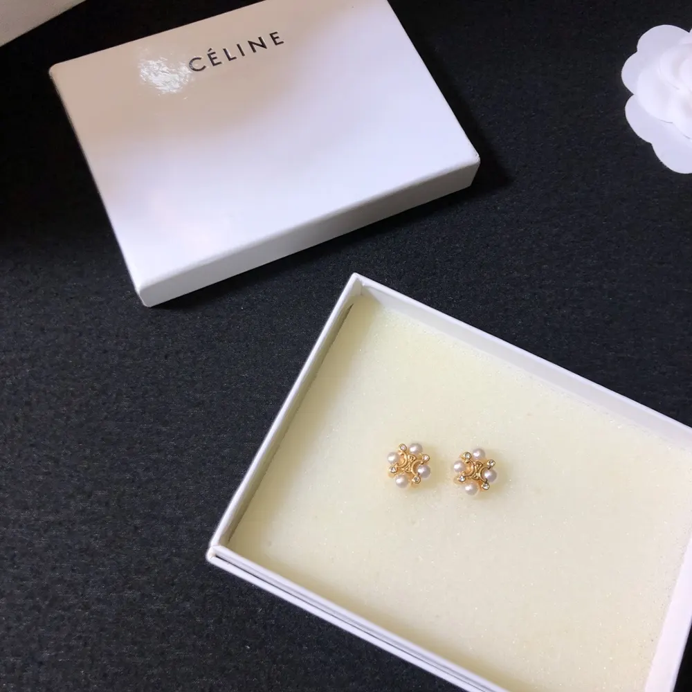 Side profile showing compact silhouette, Celine Women Les Perles studs