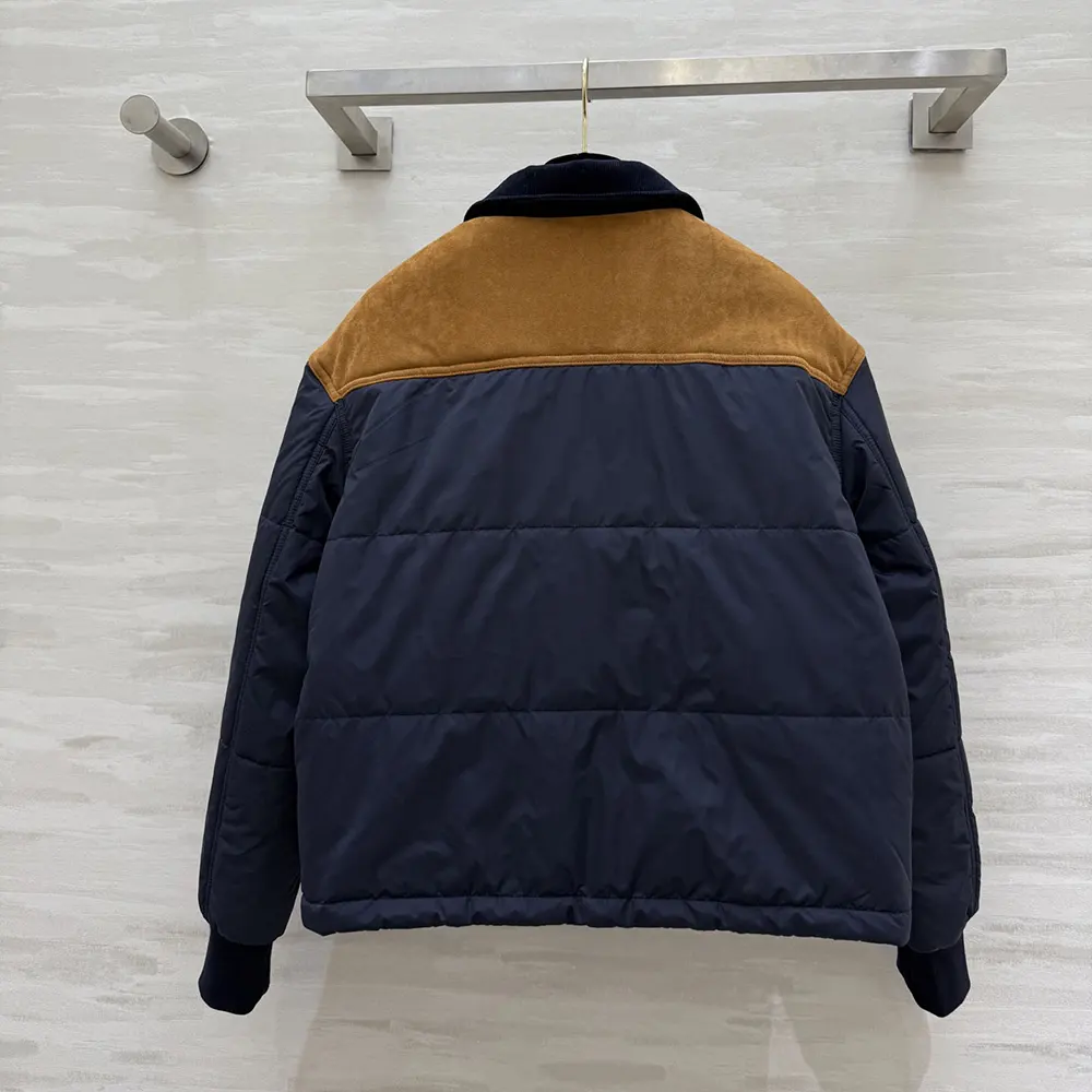 Side profile showing silhouette of Celine Men Triomphe Jacket navy coat