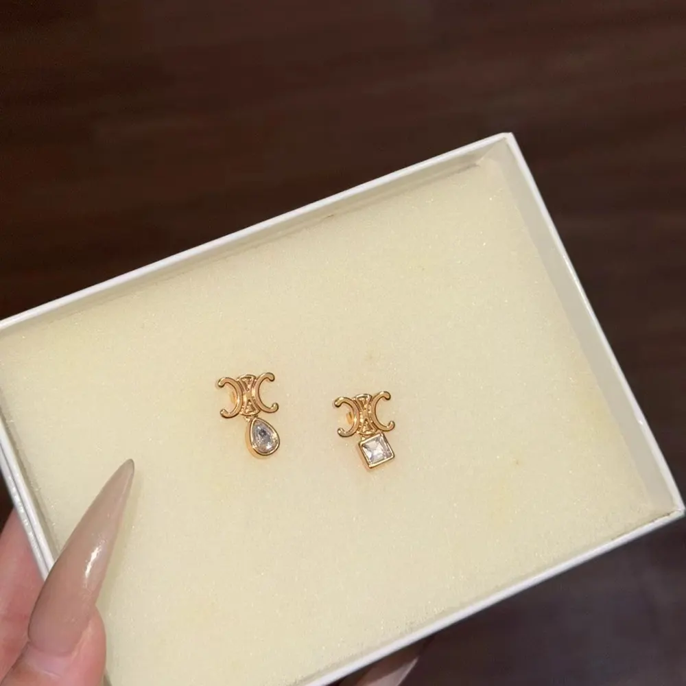 Close-up of strass detailing on Celine Women Triomphe Twinkle Earrings
