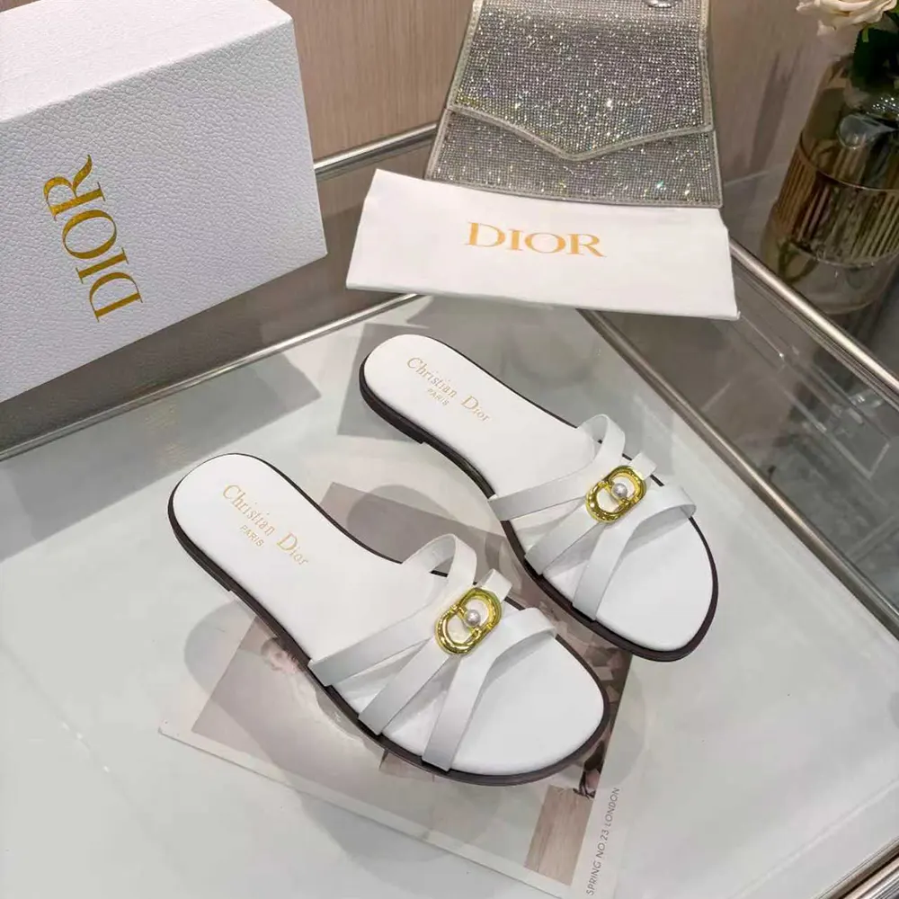 Close-up of white calfskin and Dior embossed hardware detail