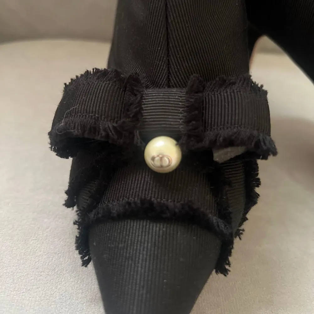 Back angle showing heel and zipper of Dior Women Adiorable Pump boots