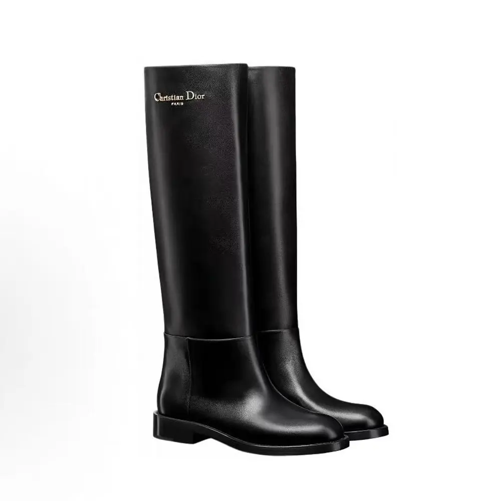 Side profile of Dior Women D-Town Boot Black Supple Calfskin showing sleek silhouette