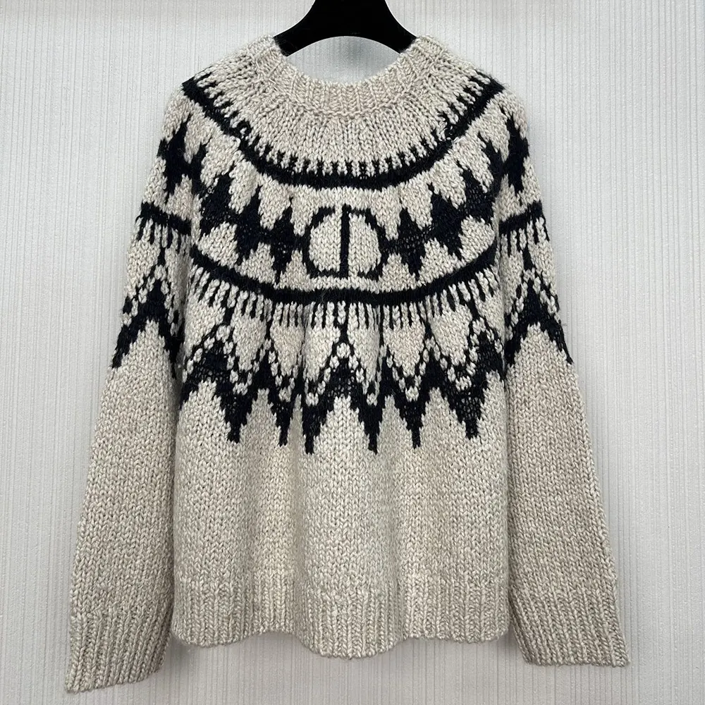 Side angle showing relaxed fit of Dior Men DiorAlps Sweater in beige tone