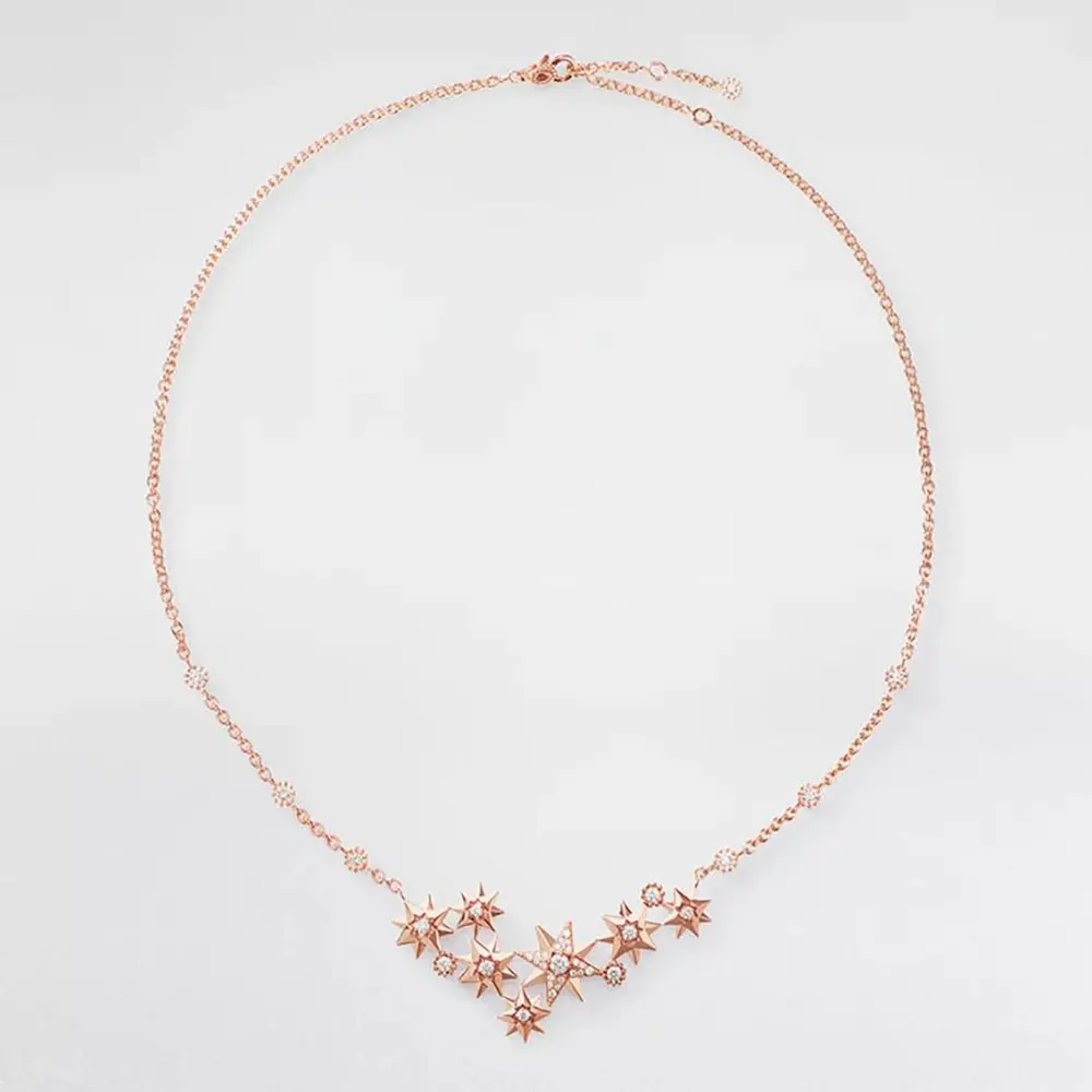 Close-up of Dior Women Étoile des Vents Necklace pink gold pendant with diamonds