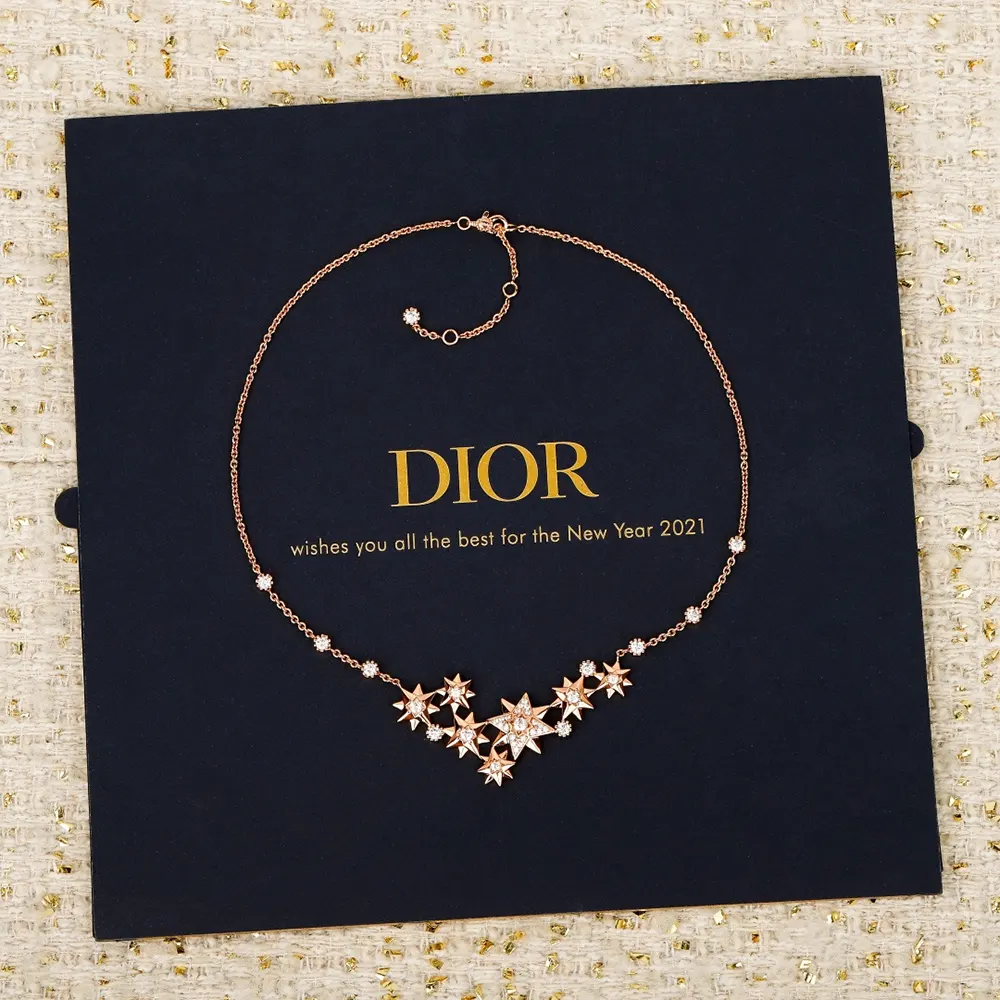 Elegant styling of Dior Women Étoile des Vents Necklace worn on neck