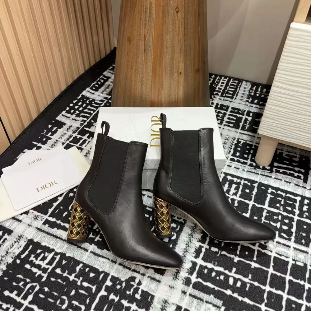 Side view of Dior Women Icon Heeled Ankle Boot Black Calfskin showing silhouette