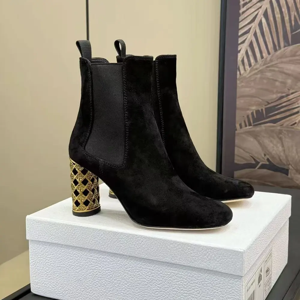 Close-up on Dior hardware and suede texture of ankle boot