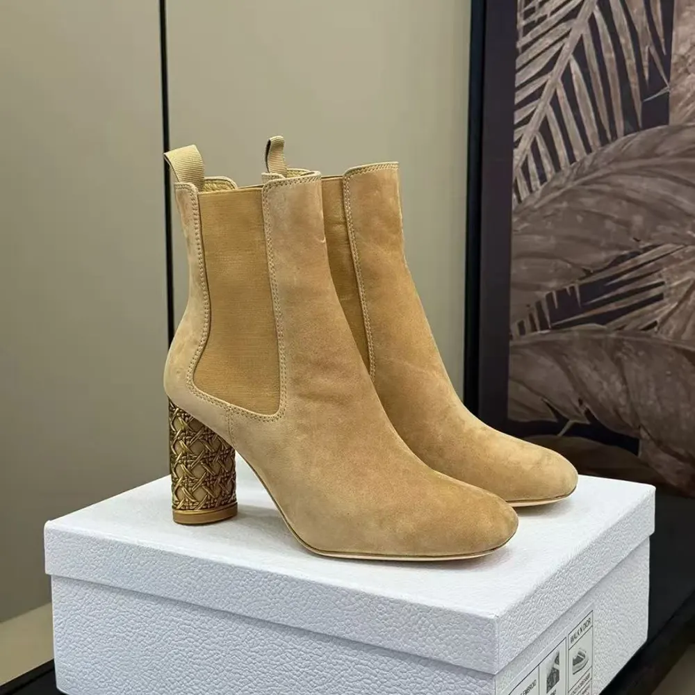 Side view of Dior Women Icon Heeled Ankle Boot Brown Suede Goatskin