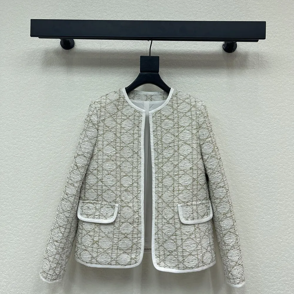 Close-up on gold-tone Macrocannage hardware on Dior Women Macrocannage Regular-Fit Jacket