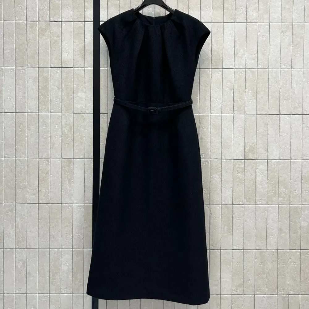 Close-up of textured bouclé fabric on Dior Women Mid-Length Belted Dress