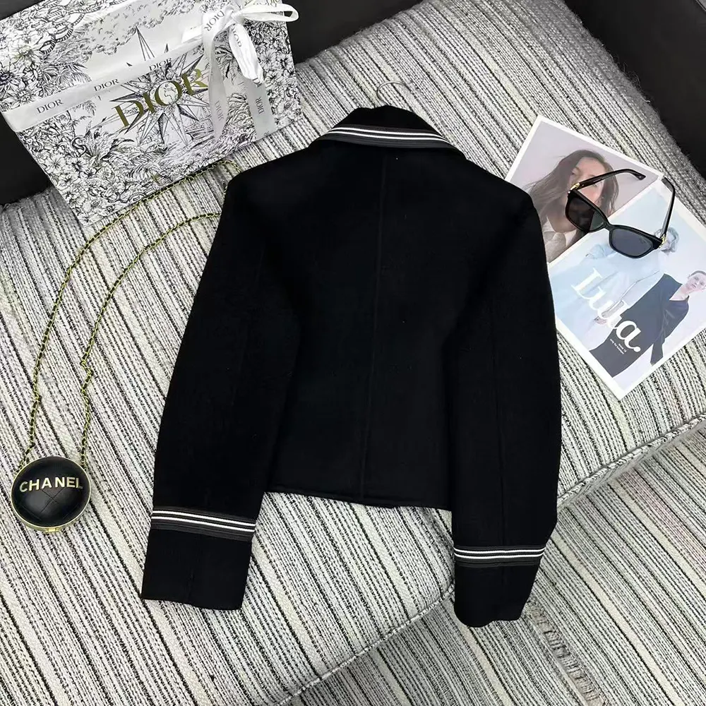 Side angle highlighting tailored silhouette of Dior Women Peacoat black felt